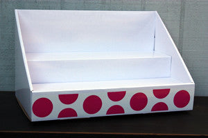 White Display with Pink Polka Dot Design