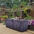 Black Wood Fabric Fitted Table Covers that  look like wood to cover folding tables at events.