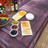 Outdoor folding table with a fabric table cover that has a realistic wood look for parties, special events or catered events.
