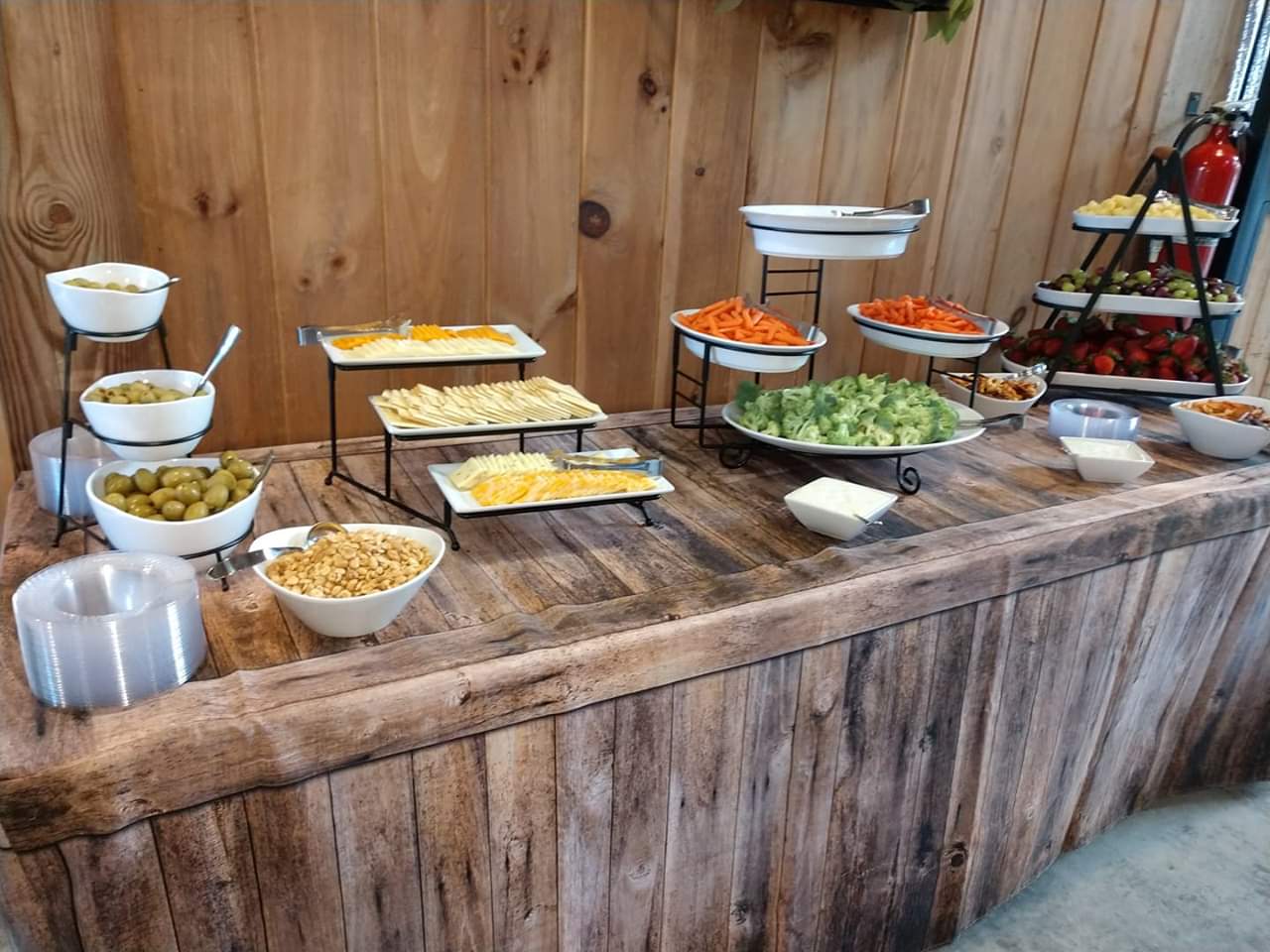 Rustic wood fabric fitted table cover for folding tables  at catered events, weddings and parties.