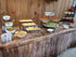 Rustic wood fabric fitted table cover for folding tables  at catered events, weddings and parties.
