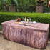 Rustic Oak Polyester Fitted Table Cover that looks like wood used at an outdoor event at a resort.
