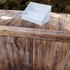 Rustic Oak Wood Look Fitted Table Cover with a cardboard display on top for vendor events, craft shows and farmer's markets.